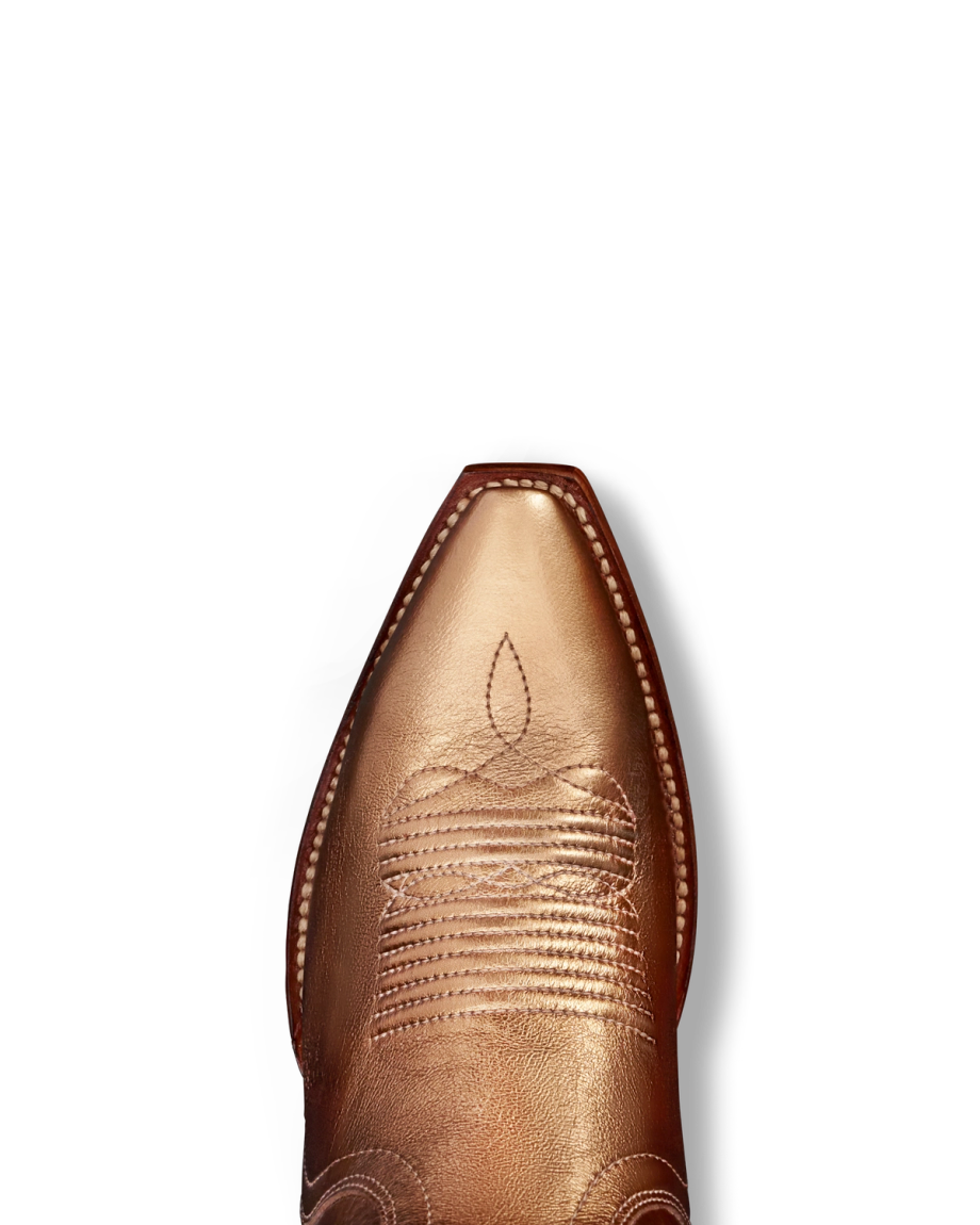 Toe view of The Loretta - Copper Cowhide on plain background