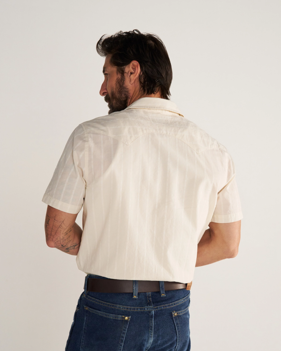 Closeup detail view of Men's Vintage Weight Short Sleeve Pearl Snap - Light Sand/Multi