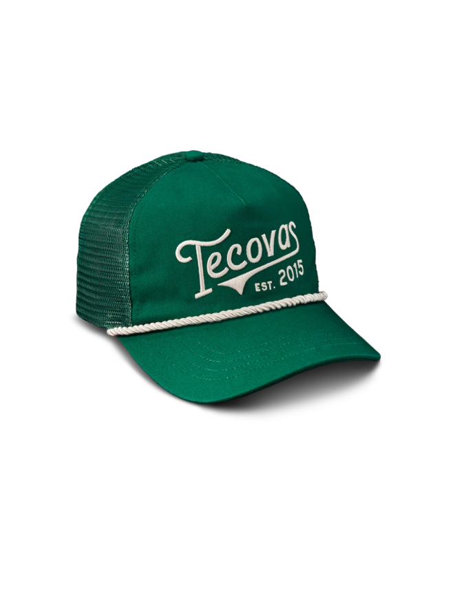 Quarterfront view of Tecovas Gameday Trucker - Green on plain background