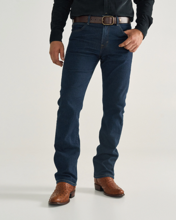 Front view of Men's Slim Straight Stretch Denim - Dark Indigo on model
