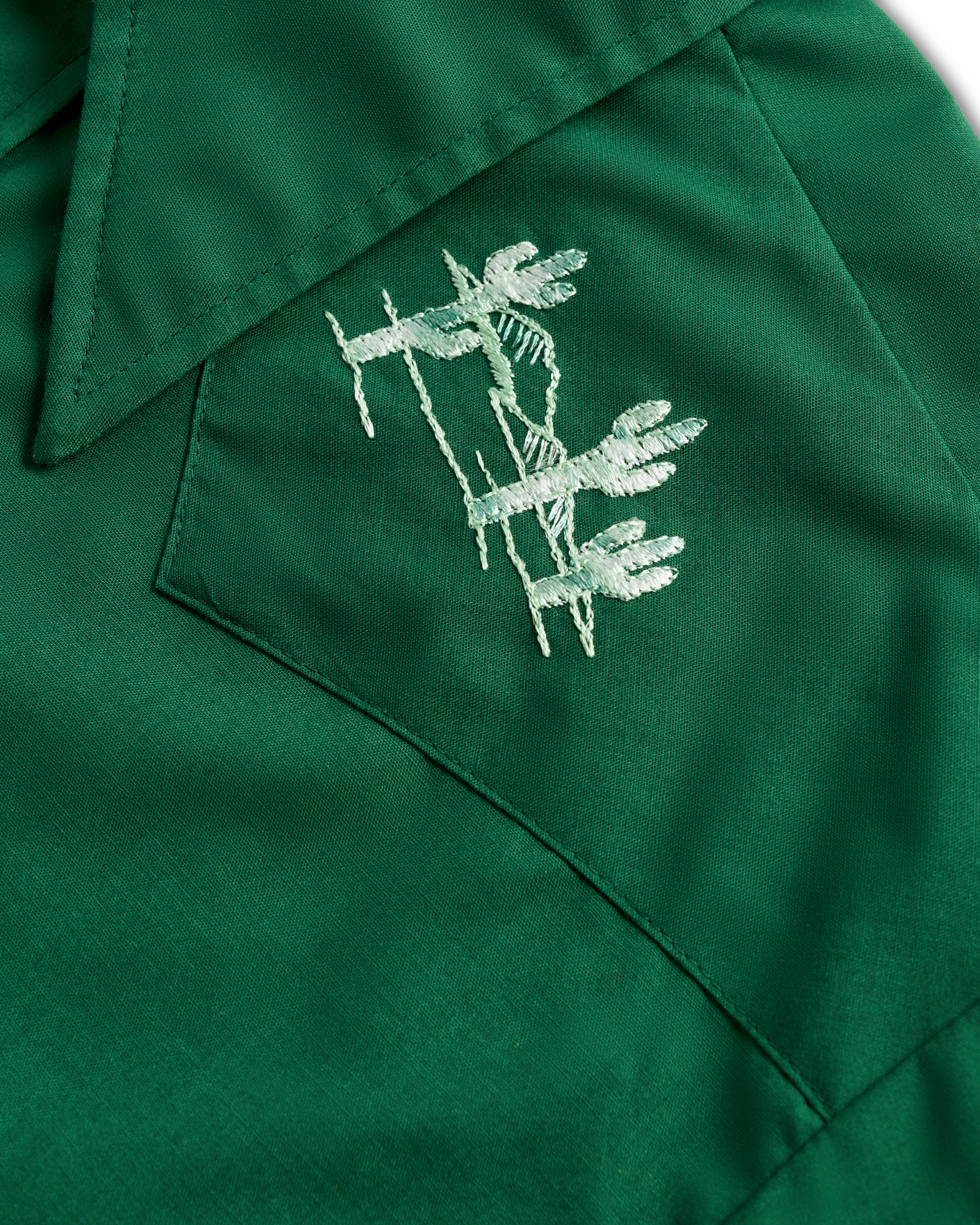 Closeup detail view of Tecovas x Cathy Hahn Men’s Vintage Embroidered Pearl Snap - Cactus Green