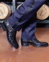 close up picture of Wyatt Midnight boots on a man's feet