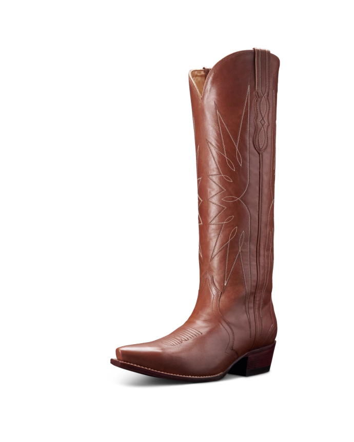 Brown leather cowboy boot with decorative stitching and a pointed toe, standing upright.