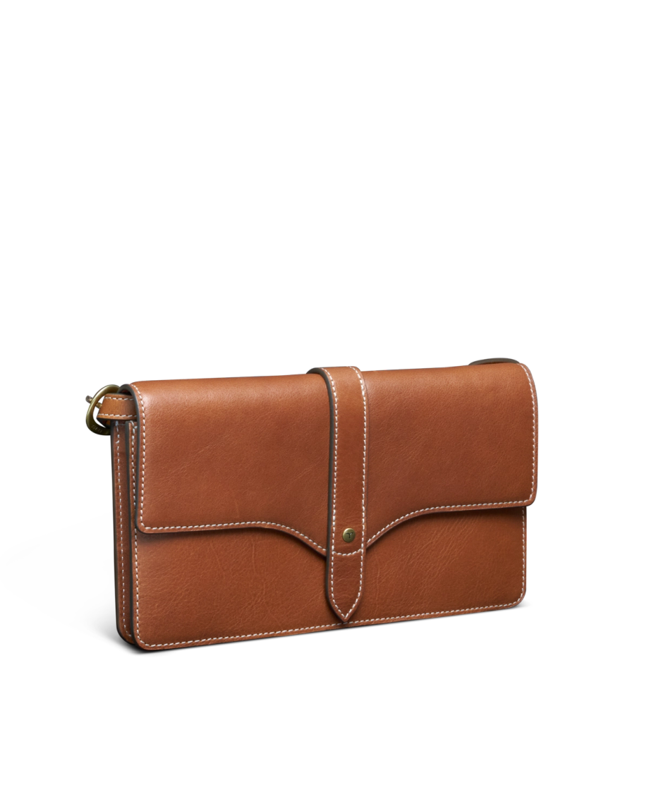 Quarterfront view of Women's Sierra Convertible Crossbody - Saddle Tan on plain background