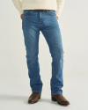Front view of Men's Slim Straight Stretch Denim - Medium Indigo on model