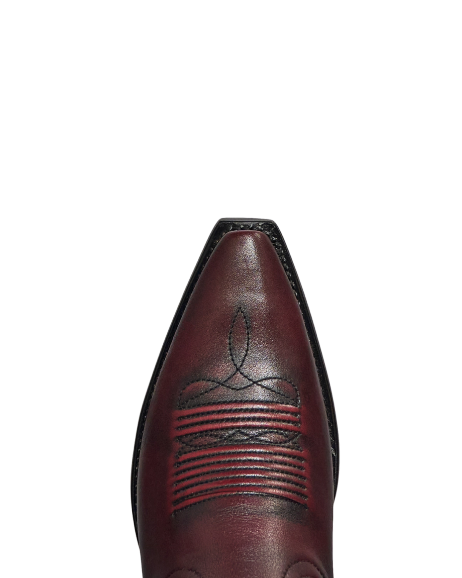 Toe view of The Annie - Black Cherry Cowhide on plain background