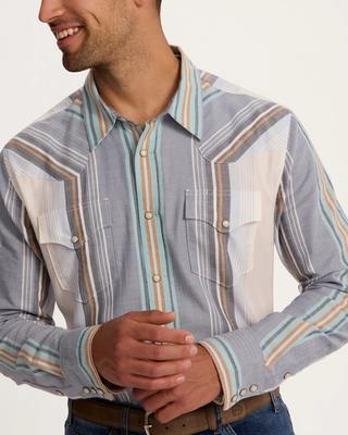 Man wearing blue multi wide stripe button down shirt 