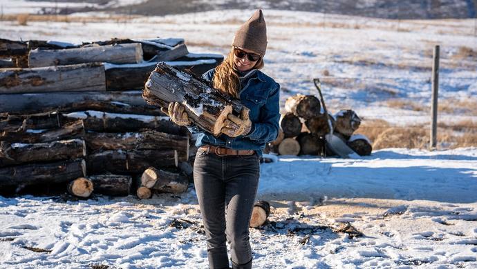 Malou holding firewood