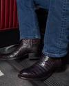 close up of Cooper Black Cherry Cowboy Boot on a man's feet 