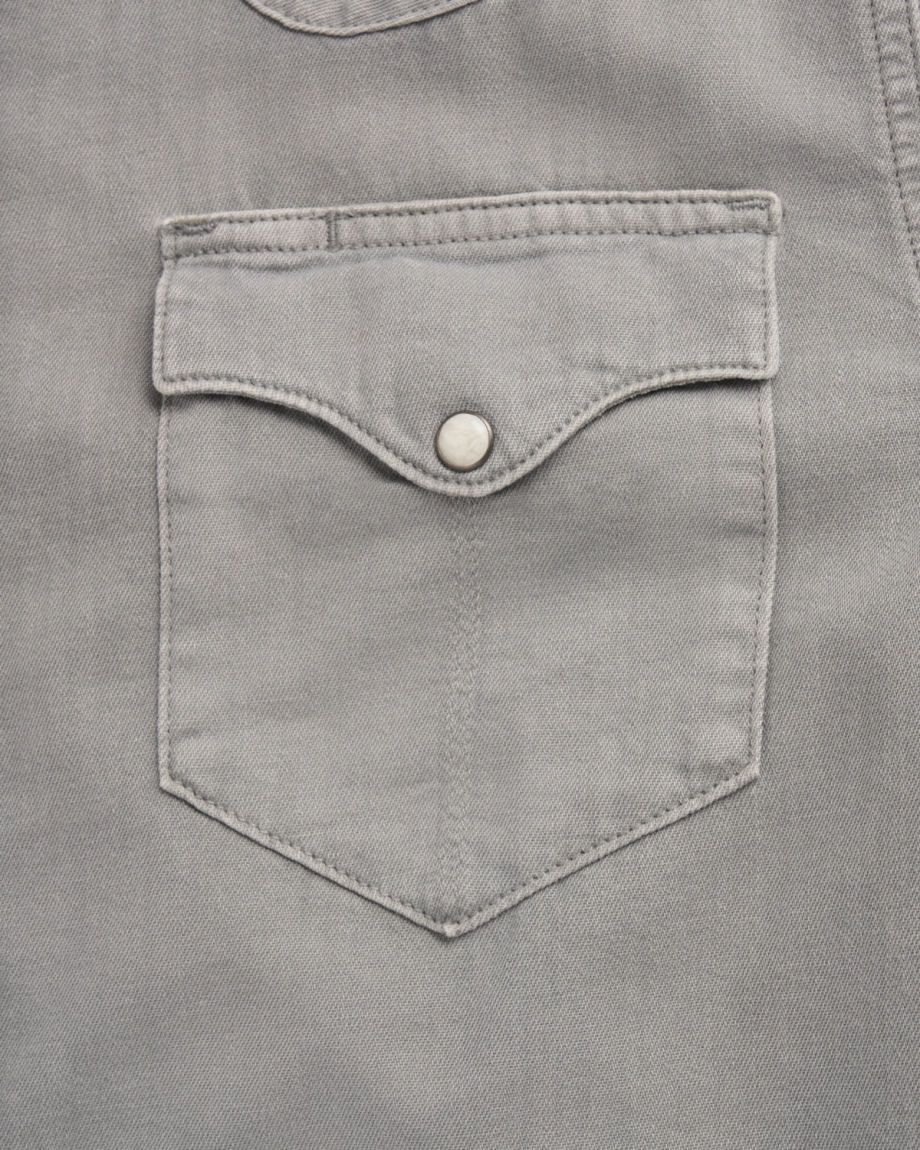 Closeup detail view of Men's Denim Pearl Snap - Light Gray