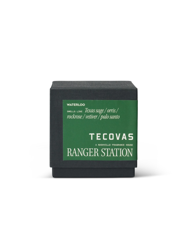 A black box labeled "TECOVAS RANGER STATION" with a green label describing the scent as Texas sage, orris, rockrose, vetiver, and palo santo.