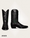 Black cowboy boots with textured leather and embroidered green cactus, moon, and star designs.