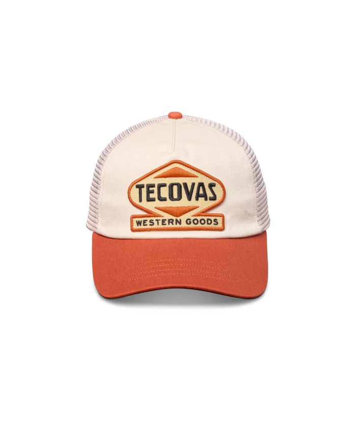 Front view of Tecovas Western Goods Patch Trucker Hat - White / Orange on plain background