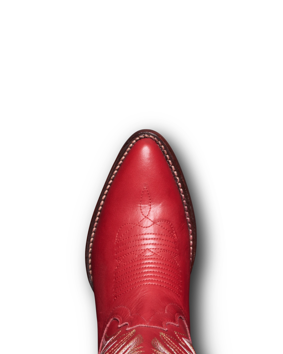A crimson, pointed-toe cowboy boot, The Abby Wide Calf Cowhide, viewed from above on a plain white background.