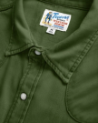 Closeup detail view of Men's Denim Long Sleeve Pearl Snap - Hunter Green