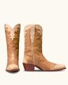 Tan leather cowboy boots with textured brown overlays on the toes, heels, and cuffs.
