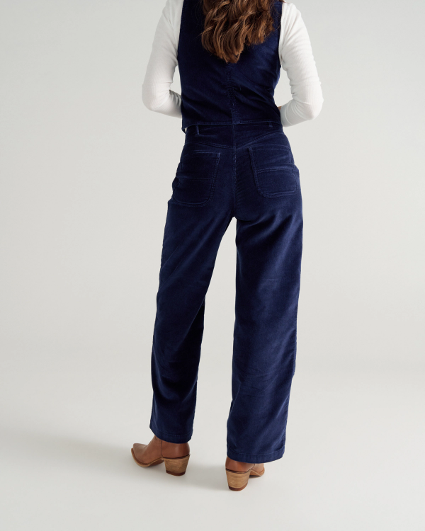 Back view of Women's Corduroy Carpenter Pant - Navy on model