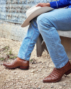 brown cowboy boots, bench