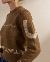 Front view of Women's Crew Neck Lucky Boots Sweater - Brown Heather/Oatmeal on model