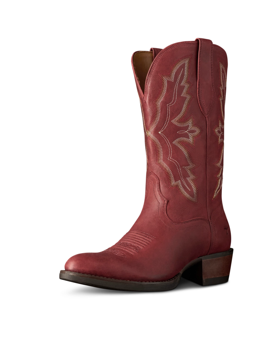 The Britt in Redwood Goat. A single red leather cowboy boot from Redwood Goat, featuring decorative stitching, a pointed toe, and a stacked heel, shown at a slight angle on a plain white background.