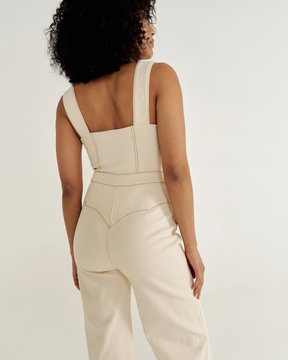 Back view of Women's Jumpsuit - Natural Denim on model