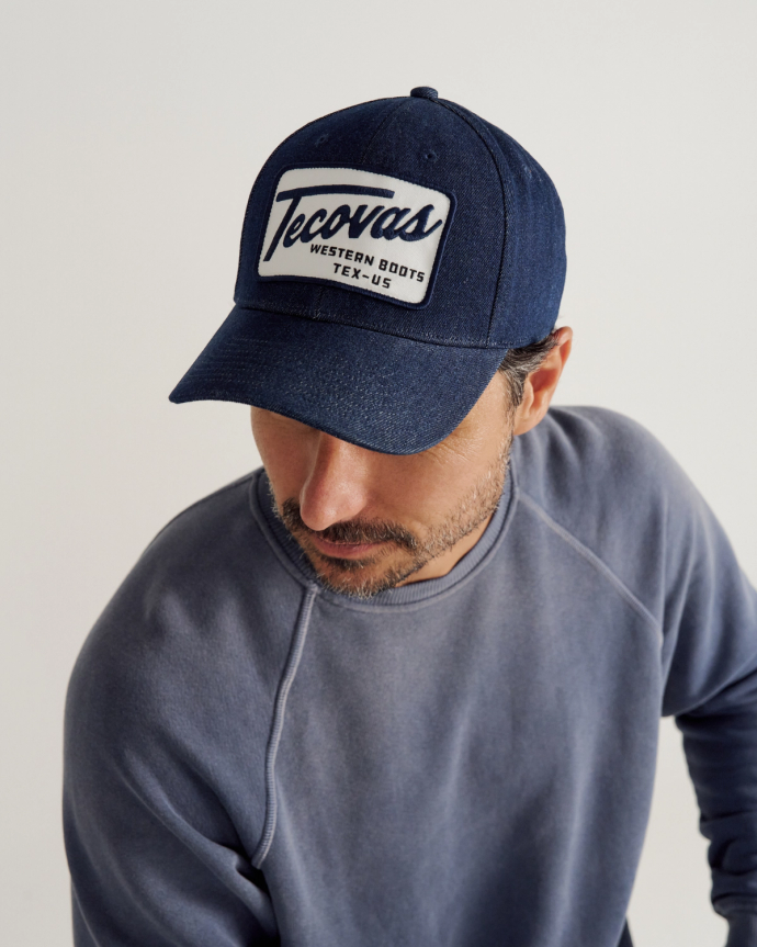 Profile view of Tecovas Denim 6 Panel Mid Profile Hat - Dark Blue on plain background