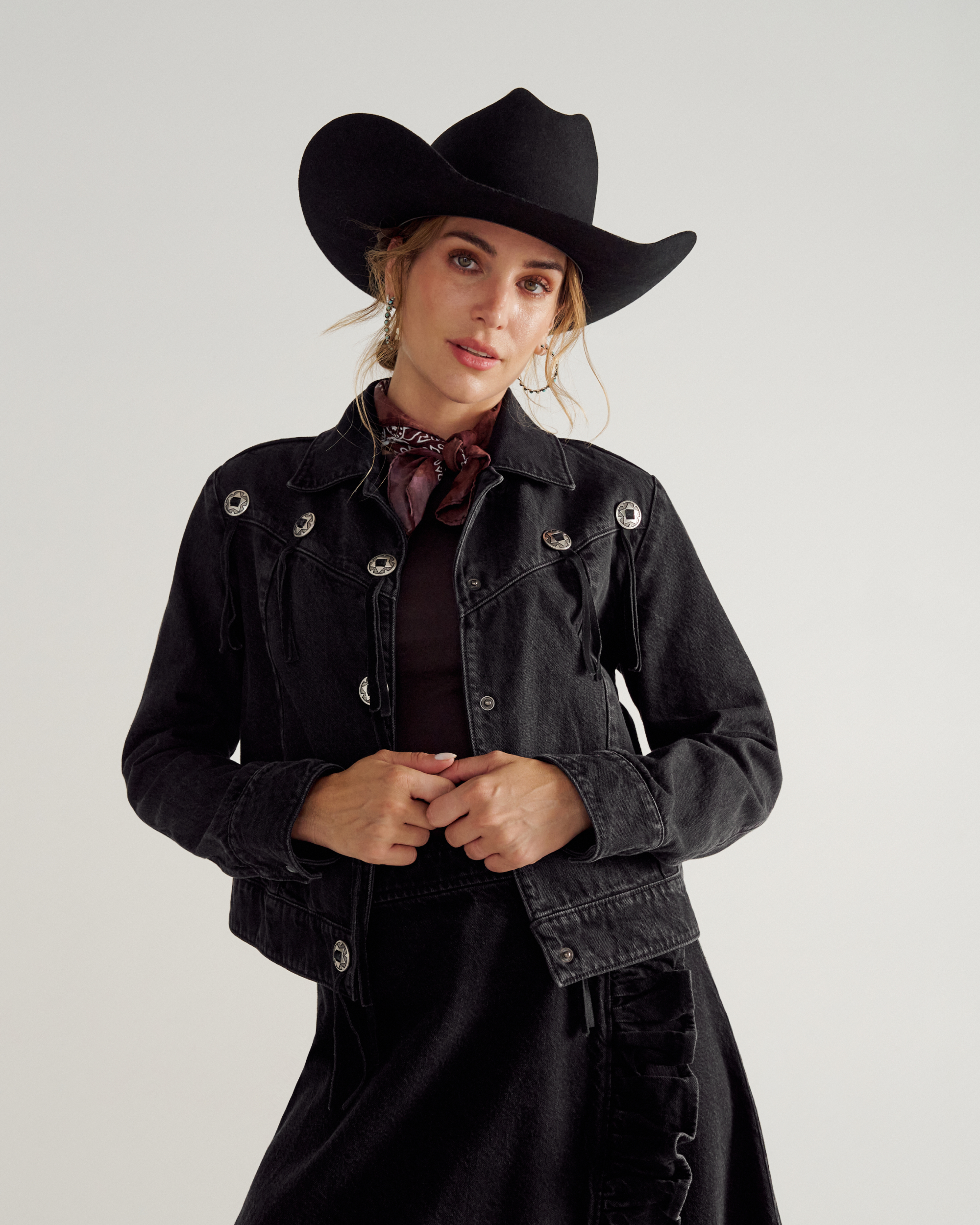 Front view of Women&#x27;s Rodeo Concho Denim Jacket - Black on model