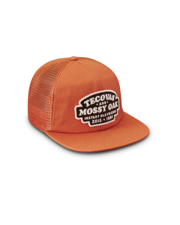 Quarterfront view of Tecovas x Mossy Oak Flat Brim Trucker - Rust on plain background