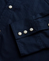 Closeup detail view of Men's Cotton Pearl Snap - Navy