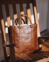 Bartlett Grab Handle Tote on a wooden chair