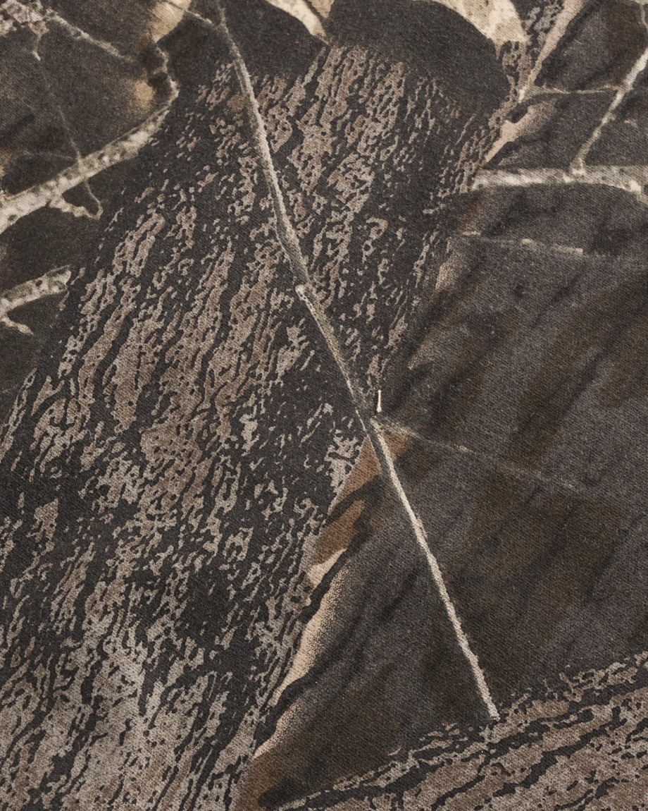 Closeup view of Men's Tecovas x Mossy Oak Waxed Ranch Jacket - Original Bottomland