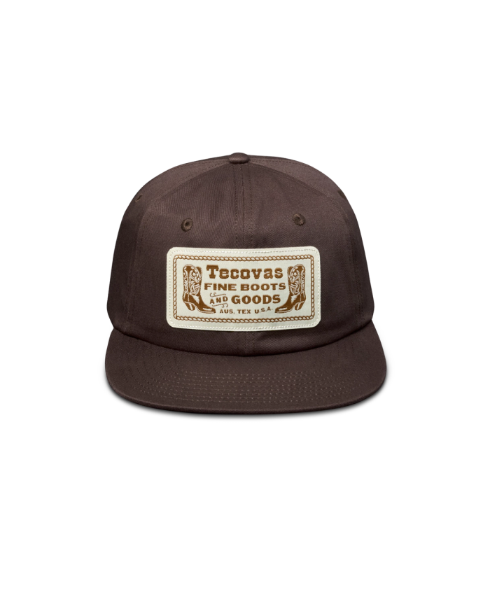 Front view of Fine Boots Flat Brim Hat - Brown on plain background