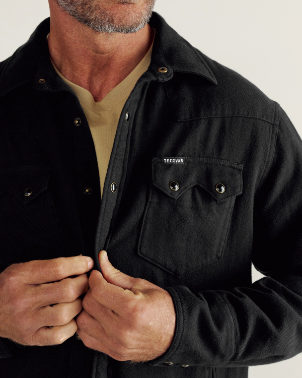 Closeup detail view of Men's Sawtooth Pearl Snap Shacket - Black