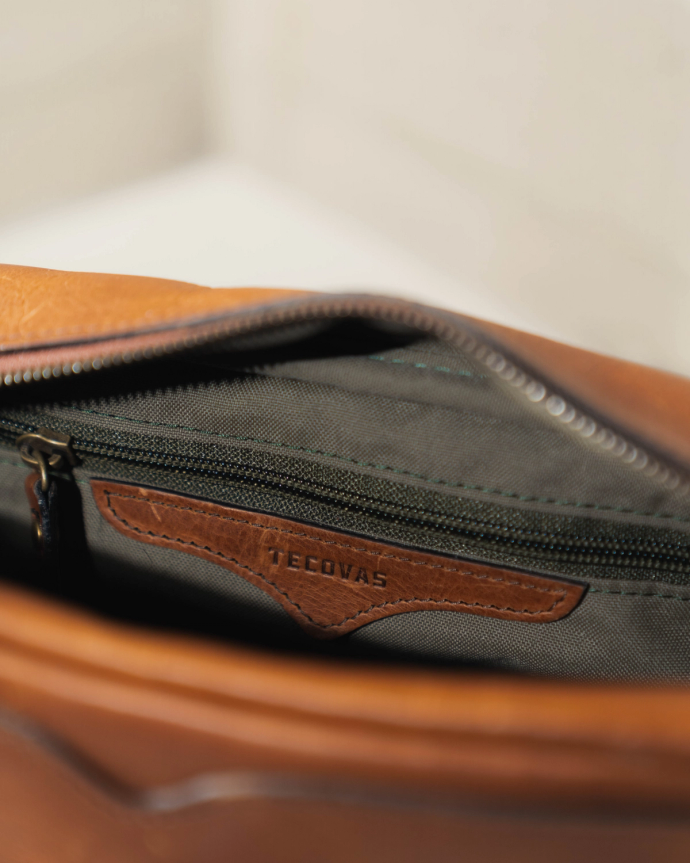 Interior image of The Bartlett Travel Kit on a bathroom counter.