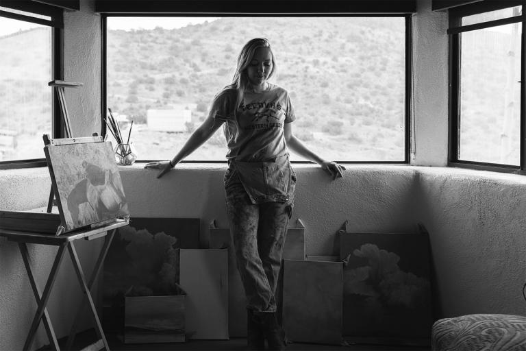 black and white image of painter Katelyn Betsill