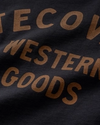 Closeup view of Women's Western Goods Tee - Black/Gold