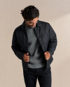 Front view of Buckaroo Waxed Canvas Trucker Jacket - Black on model