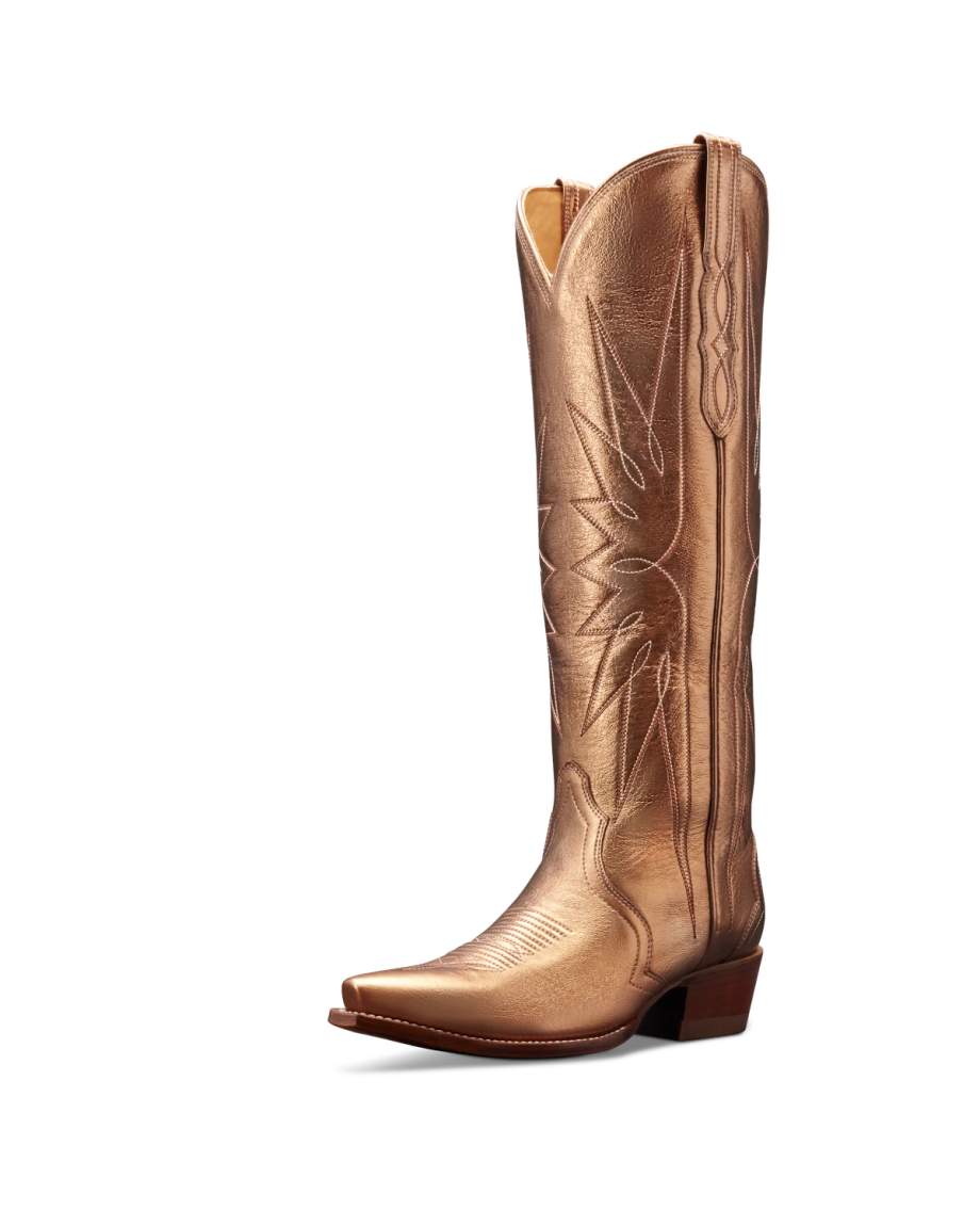 Quarterfront view of The Loretta - Copper Cowhide on plain background