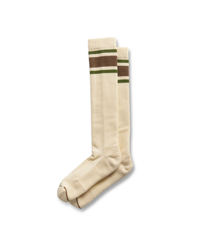 Quarterfront view of Over the Calf Performance Sock - Cream / Multi on plain background