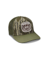 Quarterfront view of Tecovas x Mossy Oak Bottomlands Trucker - MO Original Bottomland on plain background
