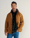 Front view of Men's Barn Coat - Saddle on model
