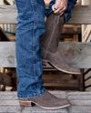 close up picture of Johnny Granite grey cowboy boots on a man's feet