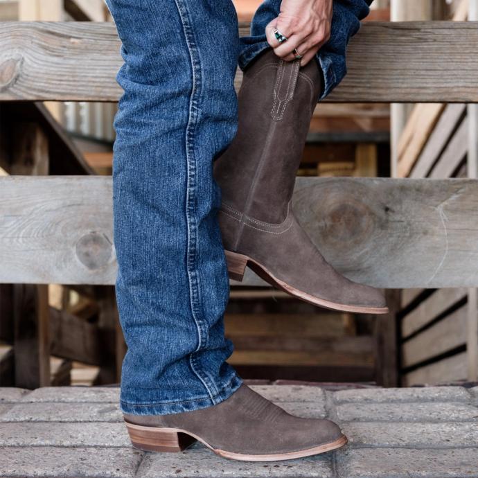 close up picture of Johnny Granite grey cowboy boots on a man's feet