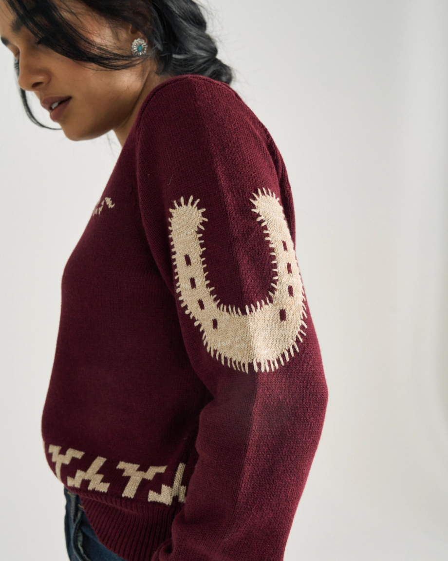 Front view of Women's Crew Neck Lucky Boots Sweater - Burgundy on model