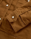 Closeup detail view of Women's Moleskin Pearl Snap Jacket - Camel