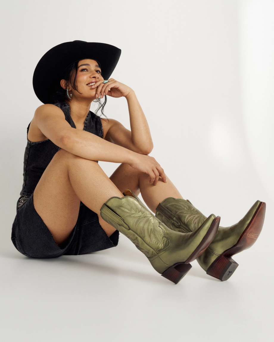 Full view of The Sadie - Olive Cowhide on model