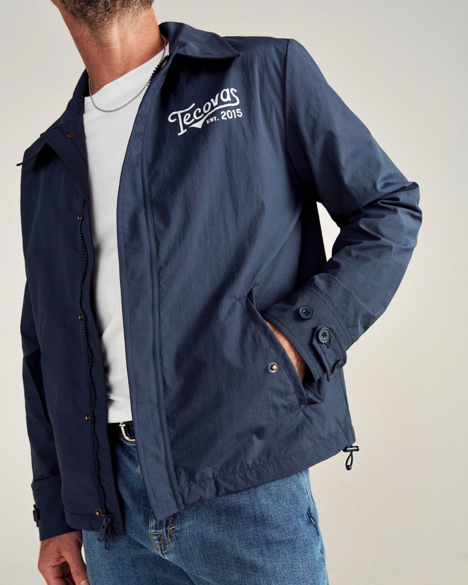 Front view of Men's Coaches Jacket - Navy on model