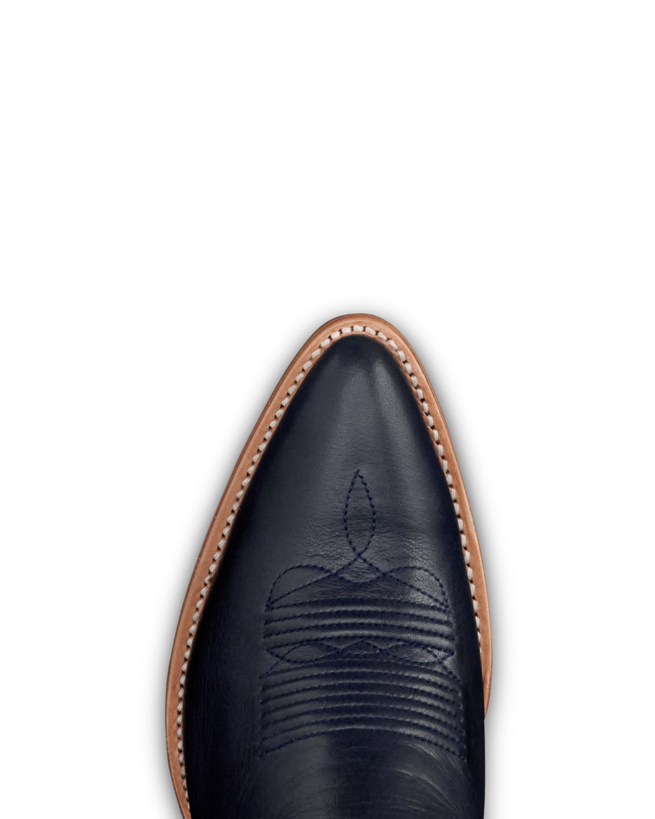 Toe view of The Jolene - Atlantic Blue/Chambray Cowhide on plain background