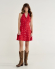Full view of Women's Sleeveless Collared Mini Dress - Red on model