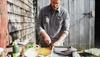 man preparing a fish to cook